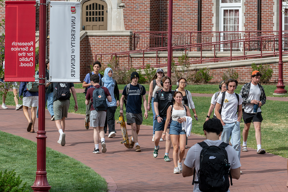 DU students walking on campus